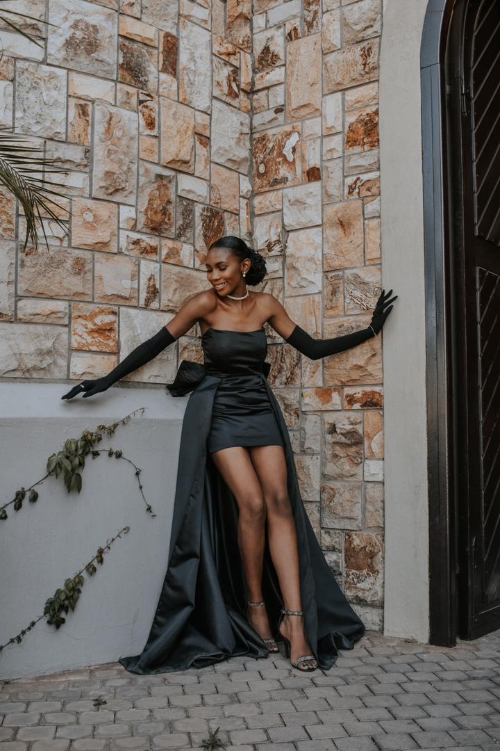 A family hugging in a beautiful outdoor setting